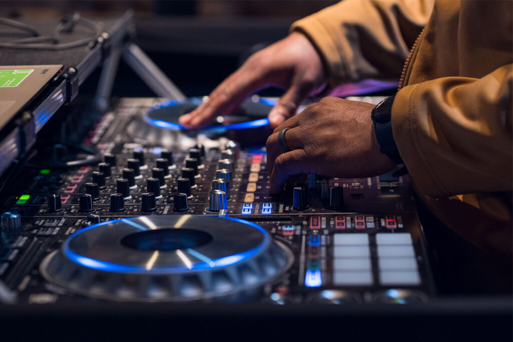 DJ mixing live on a DJ controller