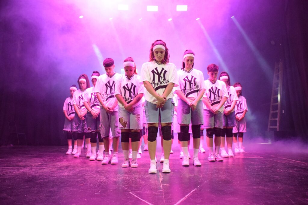 Dance team performing at a competition
