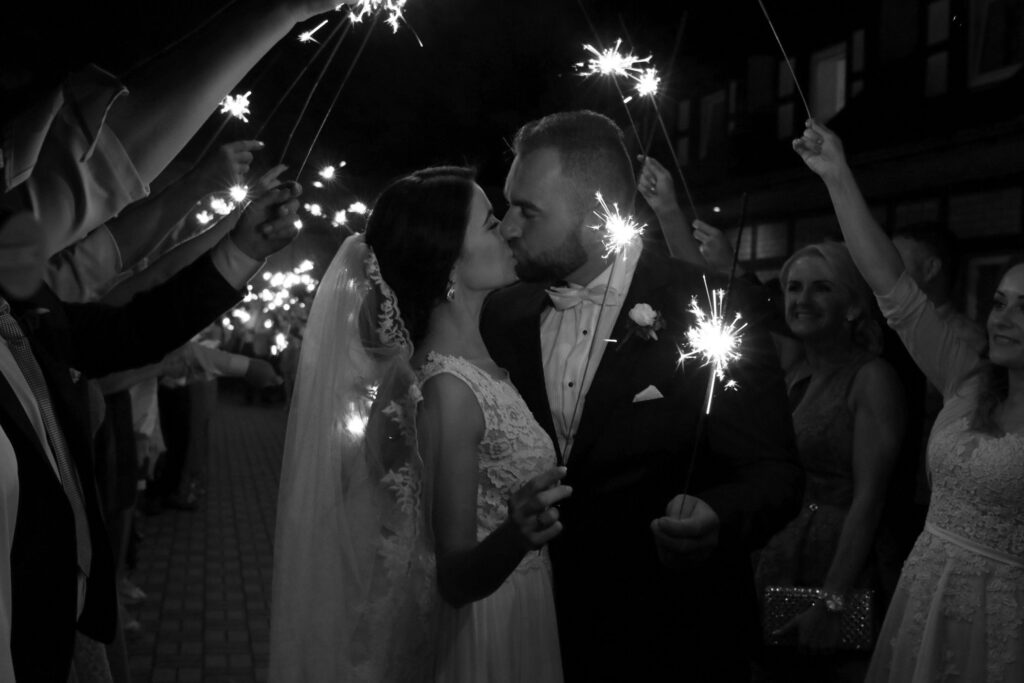 Bride & Groom share a kiss under the sparklers